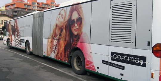 Advertising on buses in Slovenia | Sms Marketing d.o.o. | Advertisement on the left side of the bus - Comma